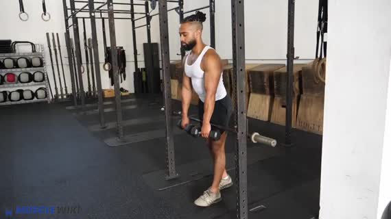 بم گارسون با دمبل و پای به عقب